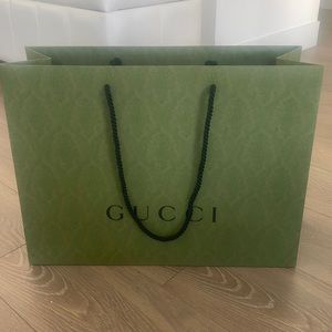 Gucci paper bag came with my purse.  Like new